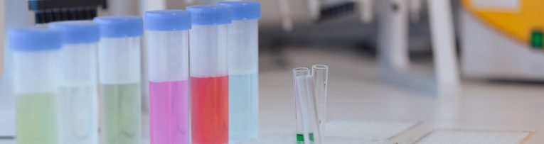 Test,Tubes,With,Vibrant,Liquids,Are,Arranged,On,A,Lab